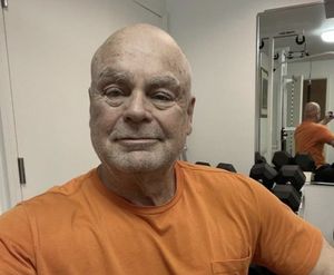 Swami Chetananda takes a selfie in his exercise room in Gold Beach.