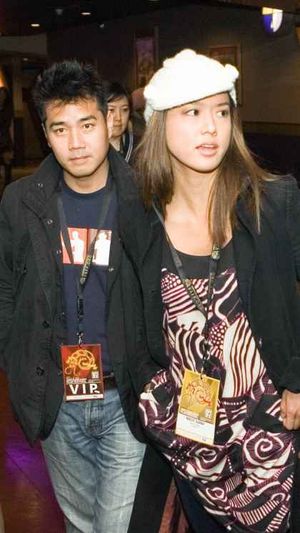 Phil Kim with wife Grace Park -- reader warns I better not mention Grace's name or husband Phil might - through his connections - do something dreadful to me.