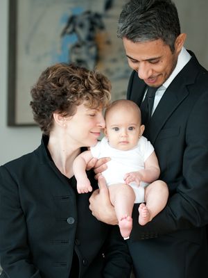 Sara Bronfman and Baset Igter with their baby. By their silence and continued support of Keith Raniere they show their support for female pubic mutilation.