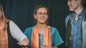 Clare Bronfman with her Nxivm orange sash.