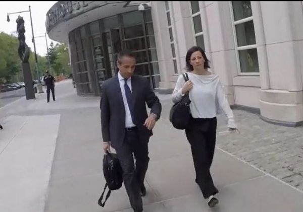 Lauren Salzman leaving court with her attorney, Hector Diaz