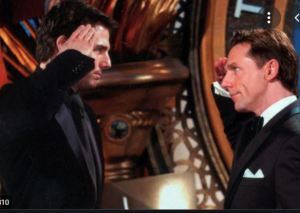 Scientology member Tom Cruise salutes Captain David Miscavige.