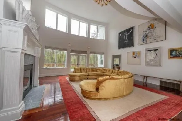 Sara Bronfman living room gold circle couch