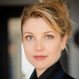 Nicki Clyne is a member of the Dossier Progect and a leader of DOS.