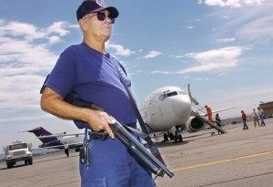 Air Safety Officer Guards Federal Prisoner Transport