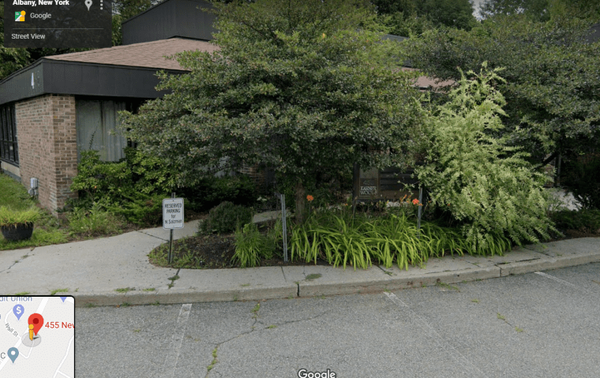 This Google Maps picture was taken during August 2019 - shortly after the conviction of Keith Alan Raniere - and shows the replacement Nancy Salzman sign in place. The sign next to it – which used to be reserved for current Nxivm leader Edgar Boone is now down.