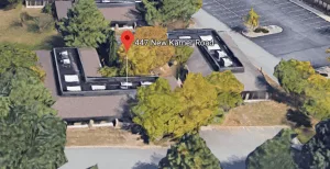 447 New Karner Rd, an office building adjacent to the main headquarters of Nxivm. This property along with two others on New Karner have been seized by the US Government