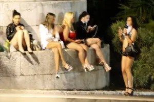 Prostitutes wait for clients in a street of the French southeastern city of Nice, on September 5, 2015.  AFP PHOTO / VALERY HACHE        (Photo credit should read VALERY HACHE/AFP/Getty Images)