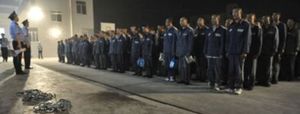 Prisoners line up for a readiness drill.