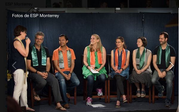 The NXIVM executive board.  Nancy Salzman, with Mark Vicente [now out of NXIVM] Alex Betancourt,,Karen Unterreiner, Clare Bronfman, Lauren Salzman and Emiliano Salinas - all wearing their prized colored sashes indicating their rank.