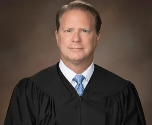 Slain Maryland judge was 52 and survived by his wife and two children