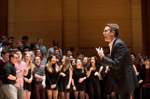 02/13/2019 - Medford/Somerville, Mass. - Seven of the nine Tufts a cappella groups join together onstage during the Deke Sharon A Cappella Extravaganza on February 13, 2019. (Alonso Nichols/Tufts University)
