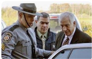 Jerry Sandusky (right)