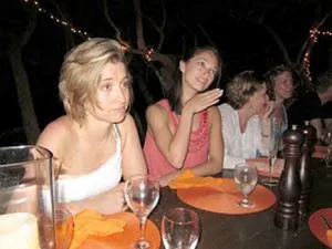 At a secret week long gathering in Necker Island, NXIVM women imbibe liquor and learn the secrets of their master, Keith Raniere. If the two women closest to the camera look familiar it is because you may have seen them on TV; They are actresses Kristin Kreuk and Allison Mack, longtime devotees and purported harem members.