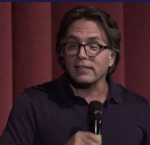 Vanguard himself appears onstage.