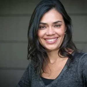 Monica Duran waits on Keith Raniere.