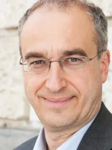 Roland Schatz, Georgescu’s financier