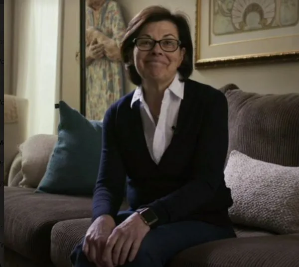 Nancy on a comfy couch