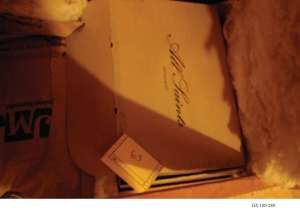 The FBI found cash in boxes in the attic.
