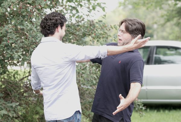 Emiliano Salinas embraces his then worshipful master Keith Raniere. Later, Salinas abandoned the hero, leaving him to his sad fate all alone.