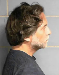 Keith Raniere from a mug shot.