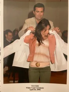Danielle Roberts receiving her white coat.