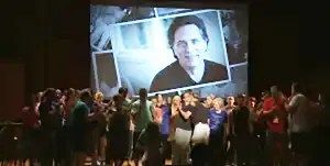 His worshipers adore his photo.