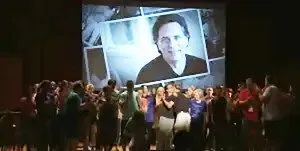 His worshipers adore his photo.