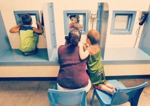 Many inmates resort to illegal cell phone to stay connected to family. Will tablets serve as a legitimate alternative?