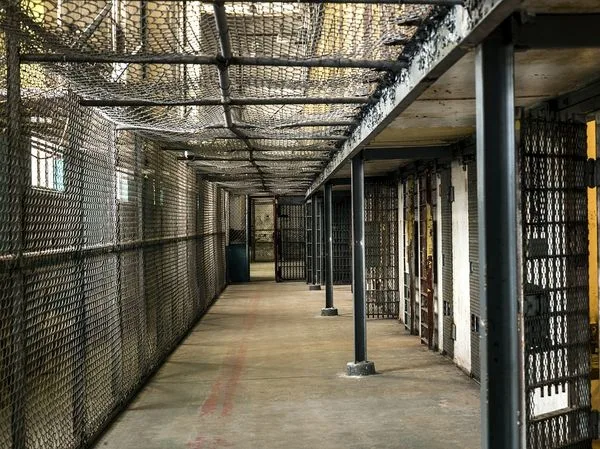 Local jails and state prisons are reducing the number of prisoners