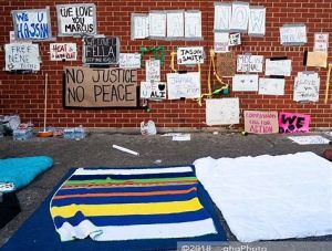 Signs left behind by protesters at MDC