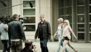 Seduced - Mark Vicente in front of courthouse