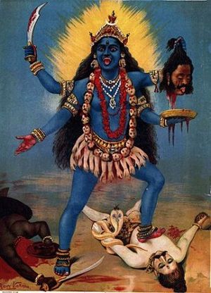 Many Hindus invoke the goddess Kali for help. Kali is portrayed with four arms, dark blue, red eyes, and lolling tongue, wearing a skirt of human arms and a garland of human heads, and holding a severed head in her hand. She is accompanied by serpents and a jackal while standing on a whitish-colored man.