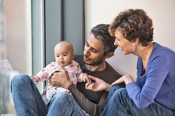 Basit Igtet and Sara Bronfman with their first-born child.