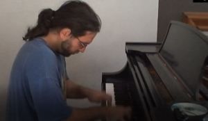 Keith Raniere played the piano.