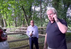 Investigative reporter Wayne Dolcefino confronted Chris Ambrose. This is the grounds of the house where he keeps guard over the children.