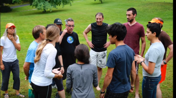 Jim Del Negro with hands on hips leads a group of brave men of the Society of Protectors.