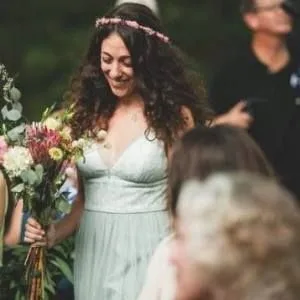 Michal Neria in her wedding dress was a picture of misery.
