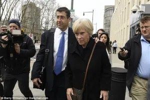 Mindy Mack leaves court after a hearing for her daughter.