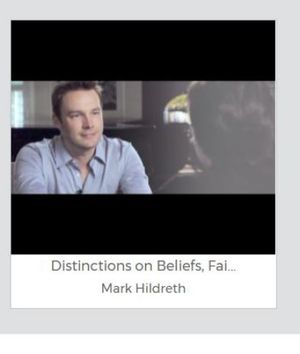 Mark Hildreth [l] appeared in a video with Keith Raniere [r] as part of the latter's 'Conversations" series.