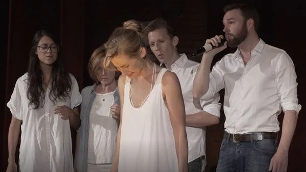 Allison with Raniere's singing group Simply Human