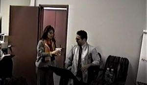 Toni Natalie at an early NXIVM class in 1998. With her loving man, Keith Raniere