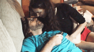 Raniere about to kiss Pam Cafritz