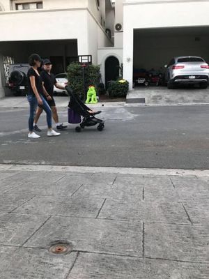 Keith Raniere pushes the stroller wherein lies baby Kemar in a gated community in San Pedro Garza Garcia. Marianna Fernandez, the mother, walks beside him. Raniere was in hiding there to avoid being arrested by the FBI and was discovered by the Frank Report.Kemar is now one and a half and his mother is Mariana Fernandez, one of his DOS slaves and longtime harem member.