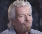 Richard Branson's photo is shown as a corporate elite.