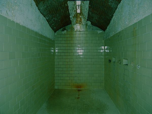 The prison showers are a popular place where they get you if you don't kick up.