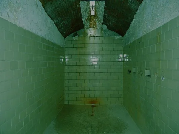 The prison showers are a popular place where they get you if you don't kick up.
