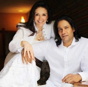Alfredo, doing his best Fabio imitation, poses with his mother.