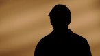 Male silhouette calling on the phone