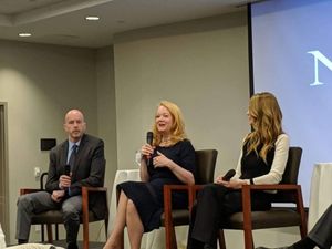 Barbara Bouchey [c] discusses her experiences in Nxivm at a forum sponsored by the Albany Times Union. Brendan Lyons, senior investigative editor for the Times Union [l] and Catherine Oxenberg [r].